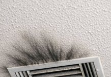 I keep cleaning these dark smudges around my air vent, but they keep coming back. It looks like soot or maybe black mold spreading across the ceiling. It’s the only vent in the house doing this. Is