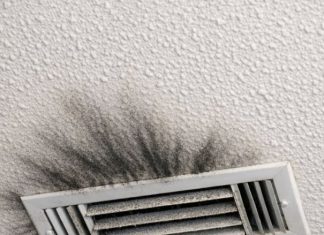 I keep cleaning these dark smudges around my air vent, but they keep coming back. It looks like soot or maybe black mold spreading across the ceiling. It’s the only vent in the house doing this. Is