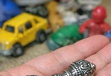 Dug this out of a bin of old toys at a garage sale. It’s heavy metal, looks like a jack but much bigger and ornate. No moving parts.