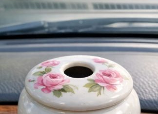 Bought a weird ceramic jar at a spring estate sale. It has a lid with a finger sized hole in the center and hand painted flowers. No smells, completely empty inside. Anyone know what this thing is?