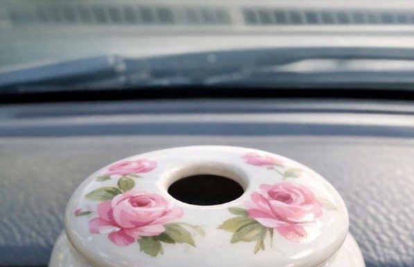 Bought a weird ceramic jar at a spring estate sale. It has a lid with a finger sized hole in the center and hand painted flowers. No smells, completely empty inside. Anyone know what this thing is?