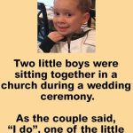 Two little boys were at sitting together in a church