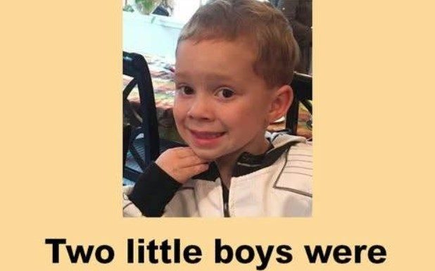 Two little boys were at sitting together in a church