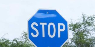 We saw a blue stop sign yesterday. Our neighbor said it means something different—any idea what that is?