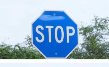 We saw a blue stop sign yesterday. Our neighbor said it means something different—any idea what that is?