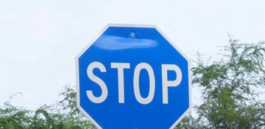 We saw a blue stop sign yesterday. Our neighbor said it means something different—any idea what that is?