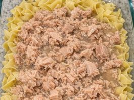 Dump undrained canned tuna and raw uncooked egg noodles in the glass casserole dish and 2 other simple ingredients to bake up a dinner so incredibly delicious your entire family will be begging for