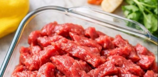 Throw raw beef strips in the glass casserole dish and 4 simple additions to get a meal so delicious your family will be begging for more!