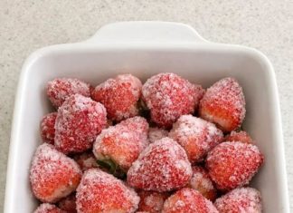 Dump a whole bag of frozen raw strawberries in the baking dish with 4 other ingredients and get a dessert so incredible your family will be fighting over the last scoop