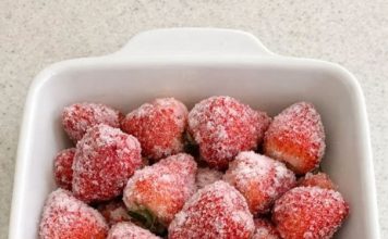 Dump a whole bag of frozen raw strawberries in the baking dish with 4 other ingredients and get a dessert so incredible your family will be fighting over the last scoop