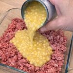 Pour Canned Creamed Corn Over Raw Crumbled Ground Beef, Combined With 3 Ingredients, Into a Glass Baking Dish for a Hearty Dinner That’s My Default