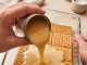 Pour sweetened condensed milk over whole unbroken graham cracker sheets in the clear glass 9×13 baking dish with 3 other pantry staples for a dessert so good your family will beg for it weekly